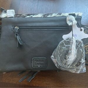 American Darling genuine leather handbag.